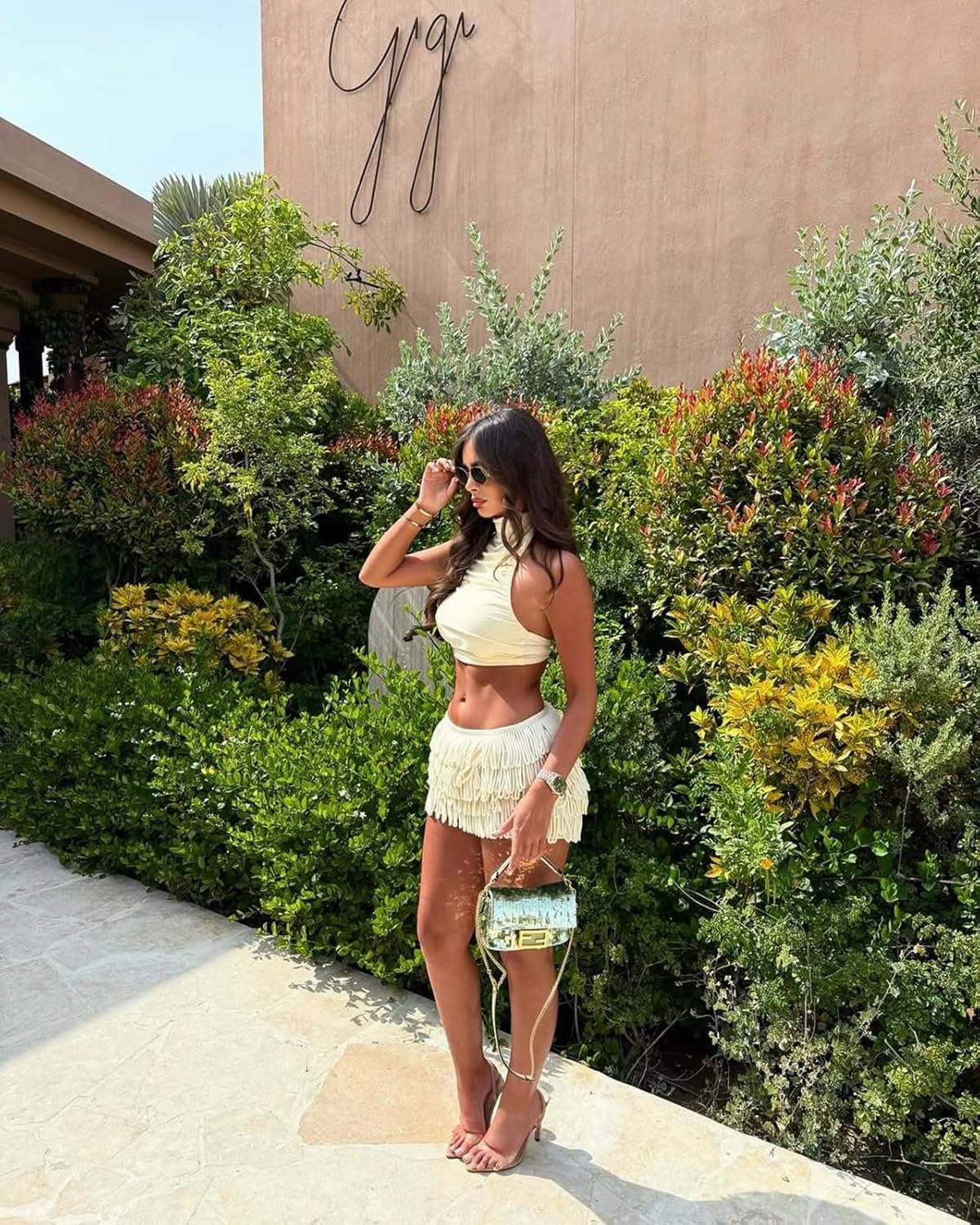Wuitrie Women 2 Piece Outfits High Neck Sleeveless Halter Crop Top Mini Tassel Pleated Skirt Solid Color Summer Date Set